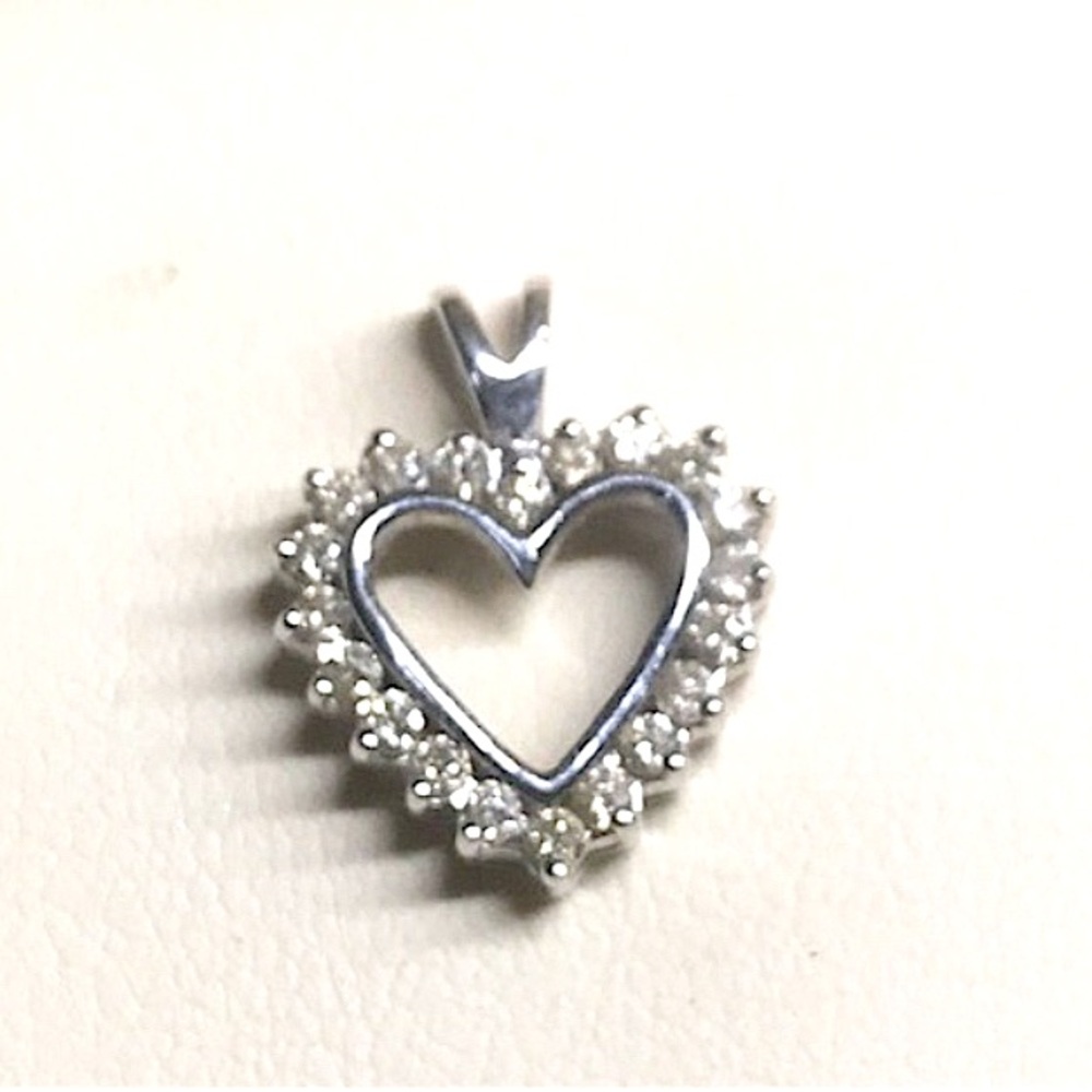 High Quality Diamonds 14kt White 
Gold Heart Pendent. Larger Sparkling Diamonds